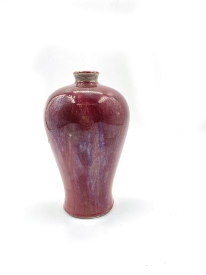null China
Meiping porcelain vase with oxblood base.
Six-character Guangxu mark.
H....