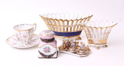 null LIMOGES AND PARIS
Porcelain set with polychrome and gold decoration including...