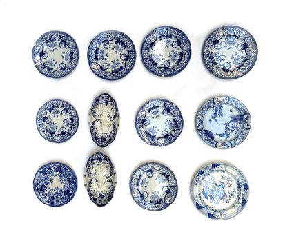 null CREIL, GIEN
Ten earthenware plates decorated with blue flowers, and two dishes....