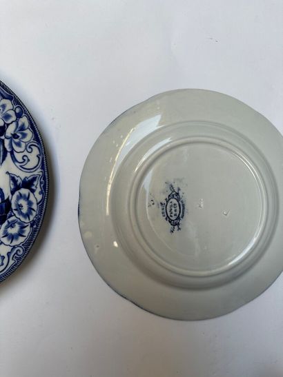 null CREIL, GIEN
Ten earthenware plates decorated with blue flowers, and two dishes....