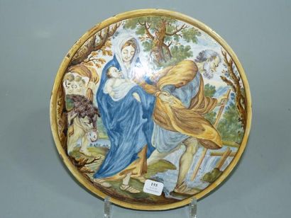 CASTELLI Plaque ronde murale à décor polychrome d'une scène représentant la Sainte...