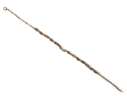 null Articulated necklace in two-tone 750 thousandths gold, the twisted links decorated...
