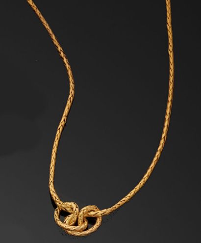 null Flexible necklace in 750-thousandths yellow gold, the center depicting a knot.
(Worn).
Length...