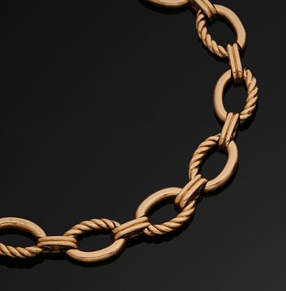 null Bracelet articulé en or jaune 750 millièmes, les maillons de forme ovale unis...