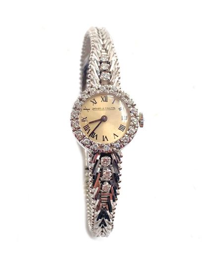 null Ladies' wristwatch in 750 thousandths white gold, cream enamel dial, Roman numerals...