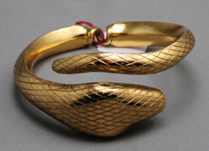 ANONYME Bracelet en métal doré représentant un serpent (réparations)