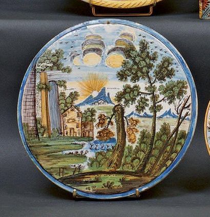 Castelli Médaillon circulaire à décor polychrome d'un paysage avec ruines antiques...