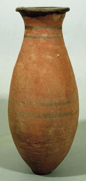 null Vase lotiforme Panse ovoïde à fond pointu, col évasé, peint en noir de bandes...