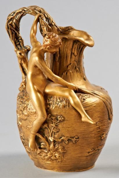 A.VIBERT Pichet «La Source». Epreuve en bronze doré à décor de femme nue en application....