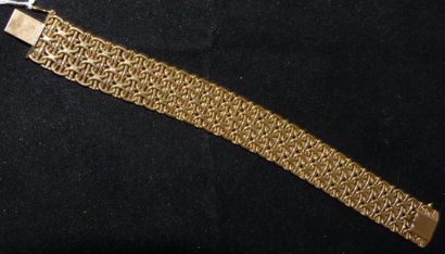 null Bracelet ruban articulé en or jaune. Poids brut: 53 g. Longueur: 19,7 cm