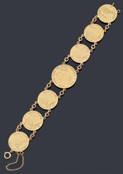 null Bracelet articulé orné de sept pièces d'or diverses. Poids brut: 60 g