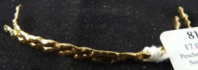 null Débris d'or jaune. (Ancien bracelet). Poids brut: 6,5 g