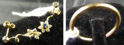 null Lot comprenant: un anneau en or jaune et une paire de boucles d'oreille en or...