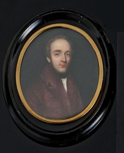 ÉCOLE FRANÇAISE VERS 1820 Portrait d'homme à la redingote carmin Miniature ovale...