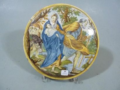 Castelli Plaque ronde murale à décor polychrome d'une scène représentant la Sainte...