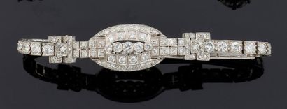 null Bracelet en or gris et platine, serti de diamants de taille 8/8 ou brillants....