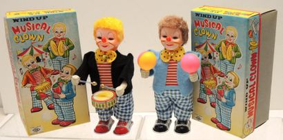 null TN jouets japonais: deux clowns musicaux (bo) H=18cm