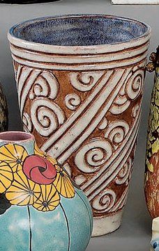 Henry CHAUMEIL Vase évasé en faïence, décor de frises obliques en bas relief à motifs...