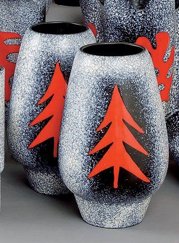 ELCHINGER Paire de vases ovoïdes sur piédouche en faïence, décor de sapin stylisé...