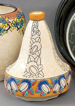 LONGWY Vase piriforme à pans coupés en faïence, décor de frises florales stylisées,...