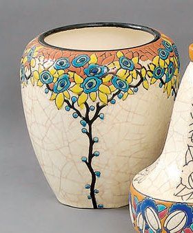 LONGWY Vase pansu en faïence, décor d'arbres fleuris stylisés, émaux cloisonnés polychromes,...