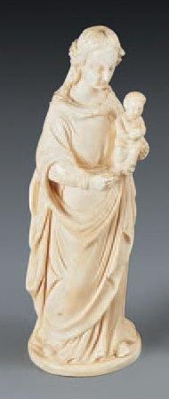 null Vierge à l'Enfant en ivoire sculpté en ronde-bosse; base circulaire. XIXe siècle,...