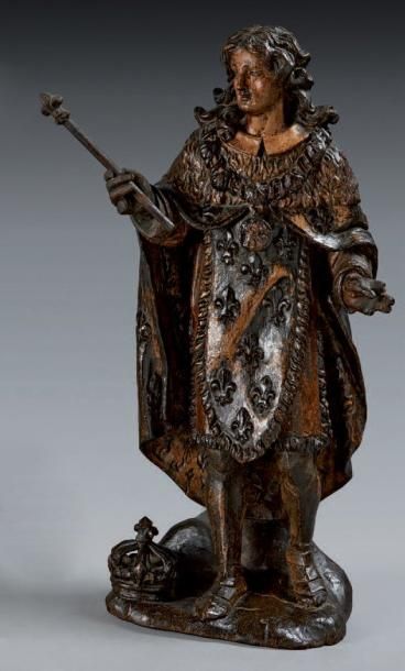 null Louis XIII en chêne sculpté polychromé et doré, dos ébauché. Debout, le jeune...