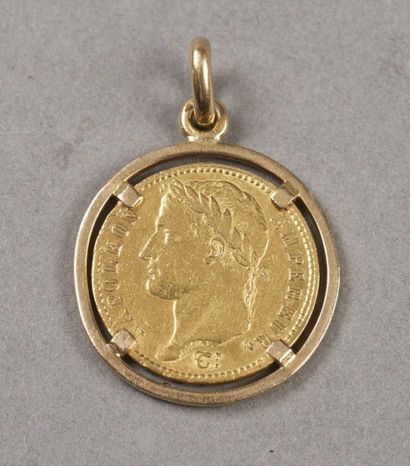 null PIECE 20 FRANCS OR montée en pendentif en or jaune 18K(750/000). Poids: 10 ...