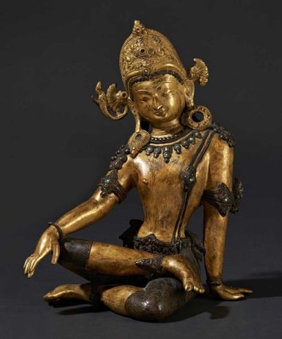 NEPAL-XXe siècle Statuette de Manjusri en bronze à patine brune et bronze doré avec...