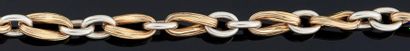 Yves Saint-Laurent COLLIER articulé en argent et vermeil, les maillons ovales. Longueur:...