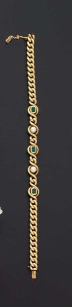 null Bracelet articulé en or jaune 18 k à maillons gourmette, serti de deux perles...