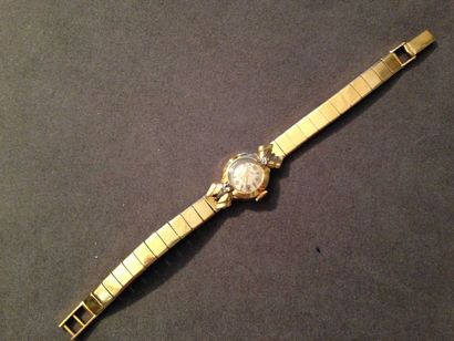 null Montre bracelet de dame en or jaune 18 k, la montre de forme ronde, le cadran...