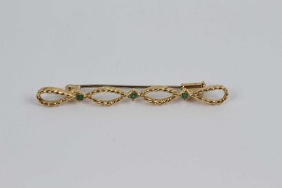 null Broche barrette en or 18 k torsadé, ornée de trois petites émeraudes. Poids...