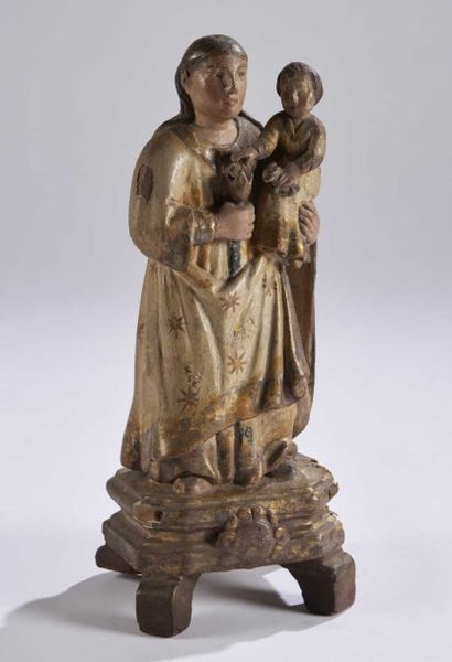 null GROUPE en bois peint et doré représentant la Vierge à l'enfant.
Fin du XVIIIe...