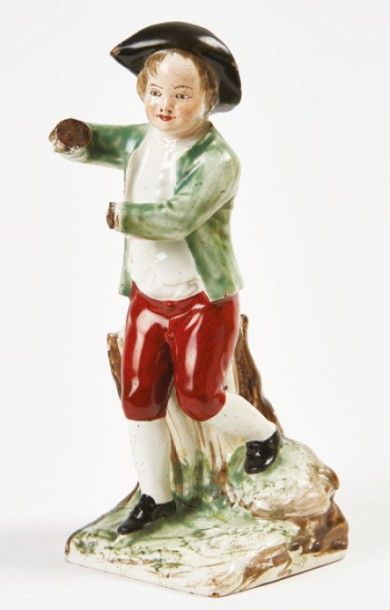 LES ISLETTES Figurine représentant un jeune garçon assis sur un rocher.
Fin du XVIIIe...