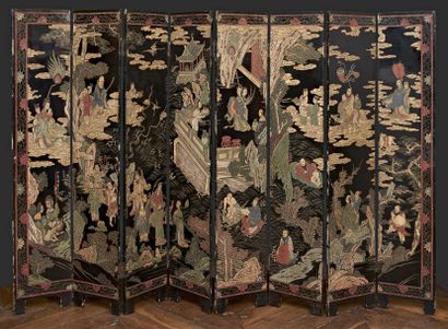 CHINE - XIXe siècle Paravent à huit feuilles en laque de Coromandel à décor des huit...