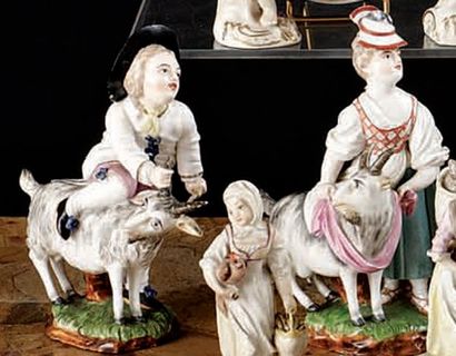 HOESCHT. Deux statuettes représentant un jeune homme tenant une chèvre par une corne...
