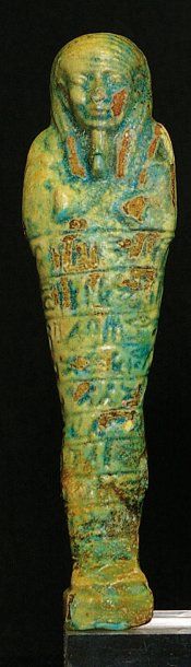 null OUSHEBTI en faience émaillée bleu turquoise. Inscription gravée en creux sur...