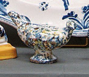 TOULOUSE Appeau en forme de palombe à décor polychrome posé à l'éponge. XIXème siècle....