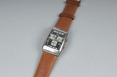 null DOLCE & GABBANA 
Montre chronomètre bracelet en acier de forme rectangaire,...