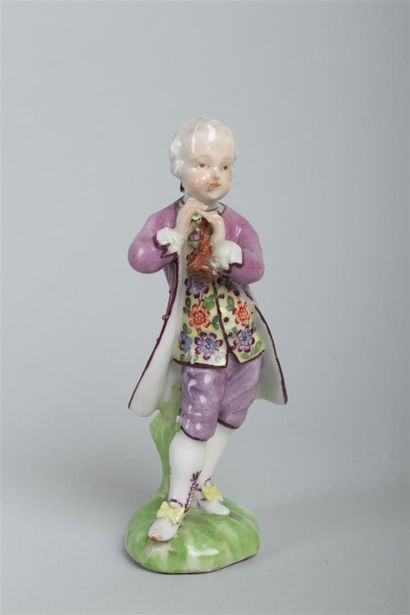 null MEISSEN : 
Statuette en porcelaine représentant un jeune homme jouant du hautbois,...