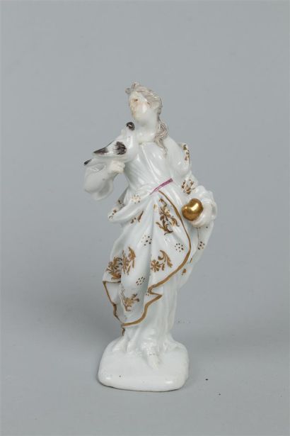 null MEISSEN
Statuette en porcelaine représentant une figure de Vénus tenant un coeur...