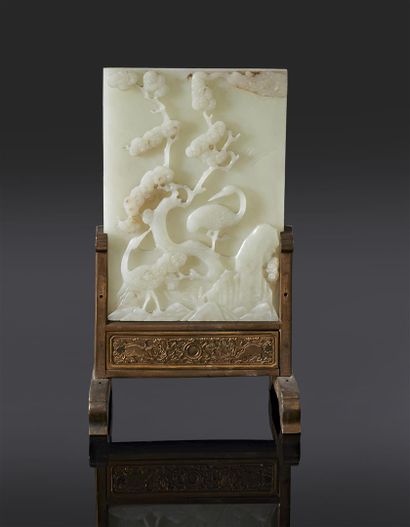 null VIETNAM - XIXe siècle
Ecran de forme rectangulaire en néphrite sculpté en relief...