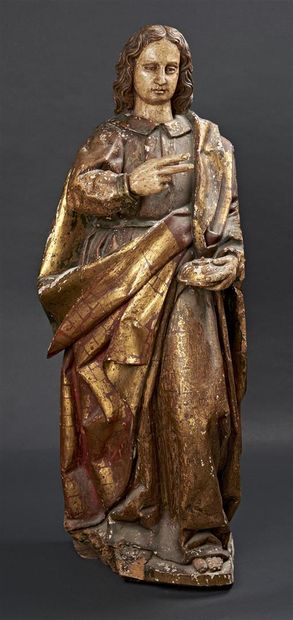 null STATUE en bois sculpté doré, prêtre un calice à la main.
XVIIème siècle.
Dim....