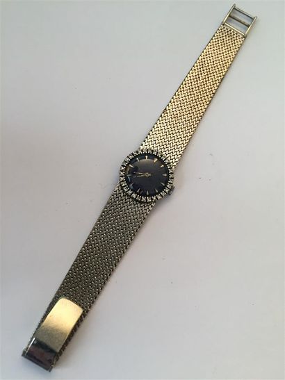 null MONTRE bracelet de dame en or gris 750°/oo, la montre de forme ronde, cadran...
