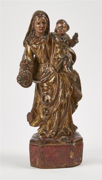 null GROUPE en bois peint et doré représentant la Vierge et l'Enfant.
XVIIIe siècle....