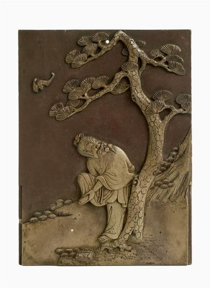 null CHINE - XIXe siècle
Ecran en stéatite brune, sculpté en relief d'un lettre sous...