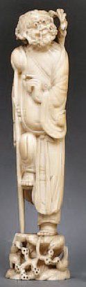 null STATIETTE en ivoire de Li Dieguai debout sur un socle s'appuyant sur sa canne....