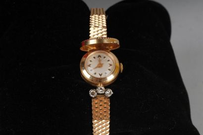 null LIP
Montre bracelet de dame en or jaune 750°/oo et platine 850°/oo, la montre...