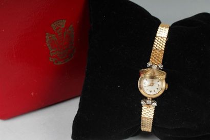 null LIP
Montre bracelet de dame en or jaune 750°/oo et platine 850°/oo, la montre...